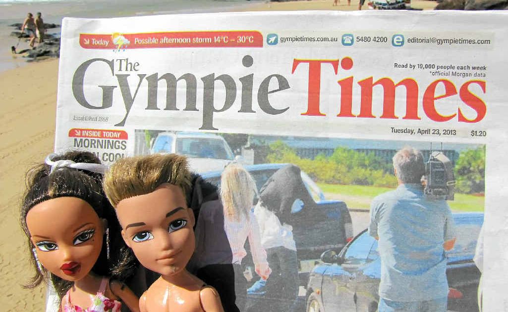 Ben and D’Arbie use The Gympie Times as a windbreak while promoting Rainbow Beach to the world. The plastic pair has been entered into Tourism Queensland’s Best Job in the World. Ben and D’Arbie use The Gympie Times as a windbreak while promoting Rainbow Beach to the world. The plastic pair has been entered into Tourism Queensland’s Best Job in the World.